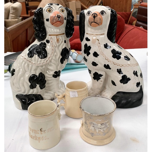 170 - A matched pair of King Charles spaniels; 2 whistle mugs and another