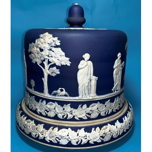 201 - A 19th century large blue jasperware stilton dish and cover decorated with classical figures in gard... 