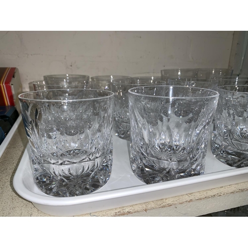 271 - A set of 11 heavy slice cut lead crystal whisky  tumblers and several others matched