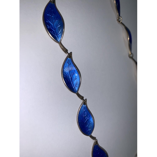 315A - A Norwegian silver necklace, the links in the form of petals in blue enamel, stamped ‘D A
(David And... 
