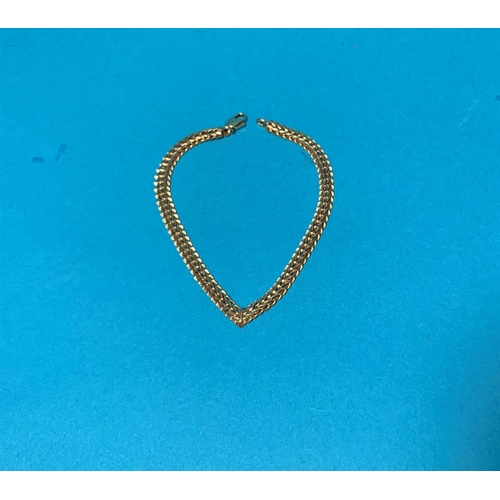315 - A 9 carat hallmarked gold plaited 'V' shaped bracelet, 8.3 gm