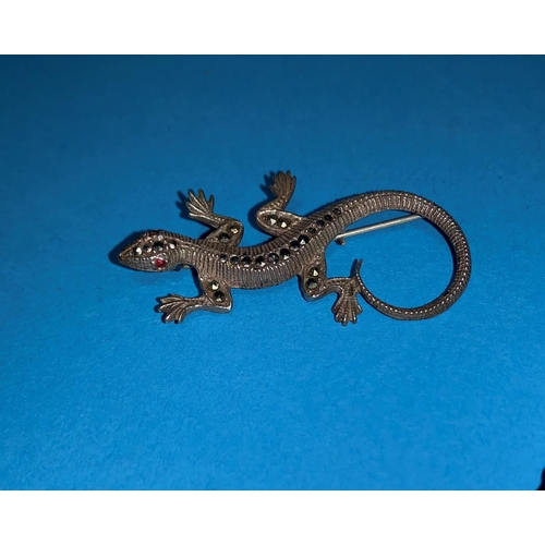 346A - 3 x 1930’s marcasite and white metal brooches in the form of a bird, a lizard and a
racehorse with j... 