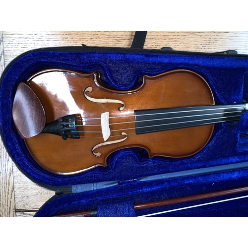 347a - A STENTOR half size violin with two piece back 31cm with natural wood bow, plush fitted
case.