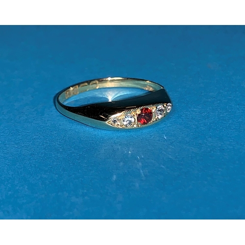 439A - A hallmarked gypsy style ring inset with 4 small clear and one ruby colour stones,
Chester 1919, 1.8... 