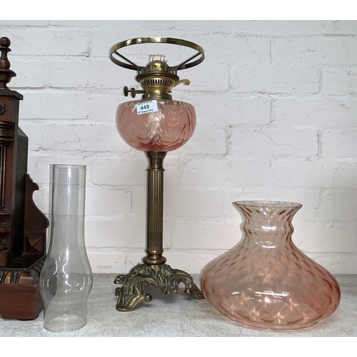 449 - A Victorian style brass and pink glass oil lamp