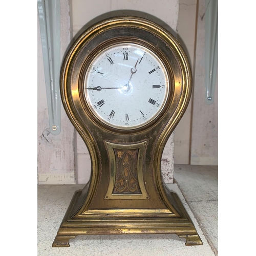 462 - An Edwardian brass mantel clock with balloon top, white enamel dial and French balance spring moveme... 