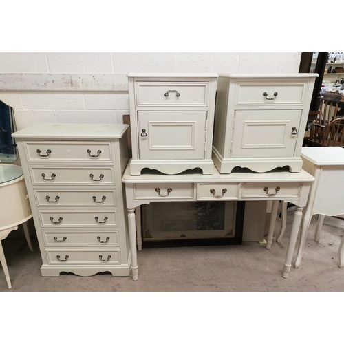 505 - A modern bedroom suite in white comprising 6 height chest of drawers, side/dressing table, and 2 bed... 