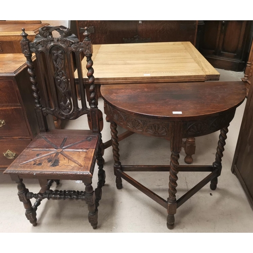 528 - A carved oak demi-lune hall table and chair