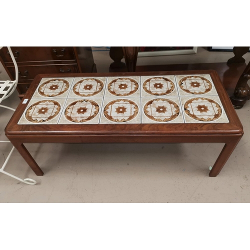 607 - A 1960's teak coffee table with rectangular tile top
