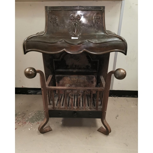 620 - An early 20th century  cast iron Arts & Crafts dog grate with integral fire back and bronze canopy, ... 