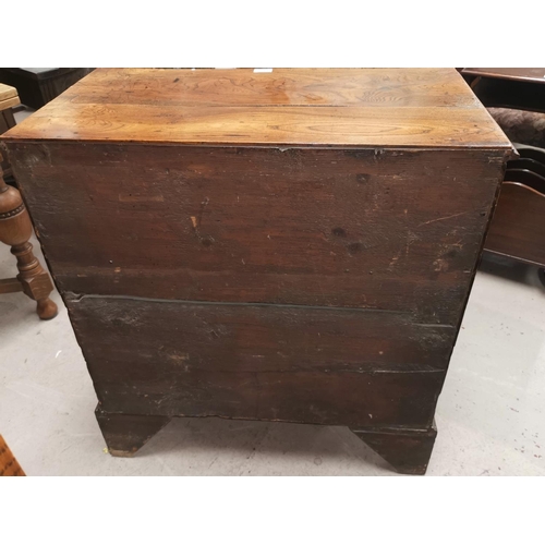 649 - A Georgian oak 3 drawer chest with brass drop handles on pierced back plates, on bracket feet