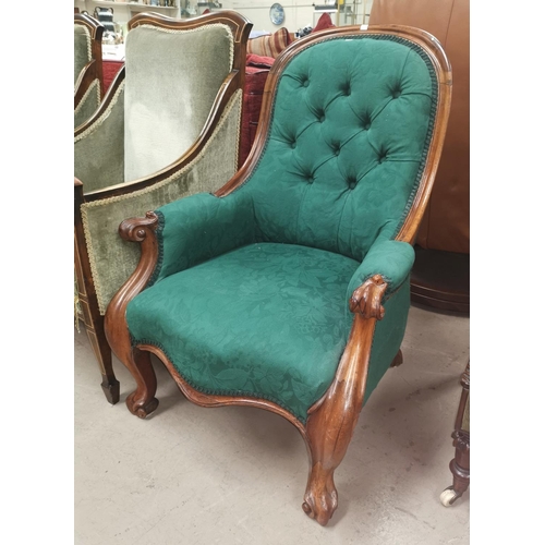 654 - A Victorian lady's rosewood spoonback armchair in green, with knurled arms and feet