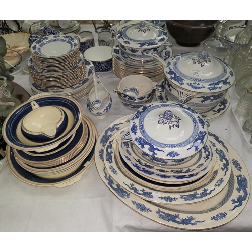 239 - A Booths Dragon pattern blue and white part dinner service; A 1920’S WHITE PAINTED WOVEN CANE ARMCHA... 