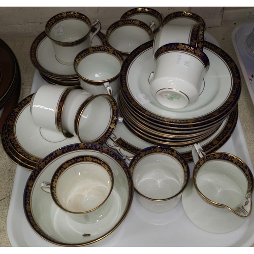 260 - An early 20th century Diamond China part tea service with blue and gilt decoration