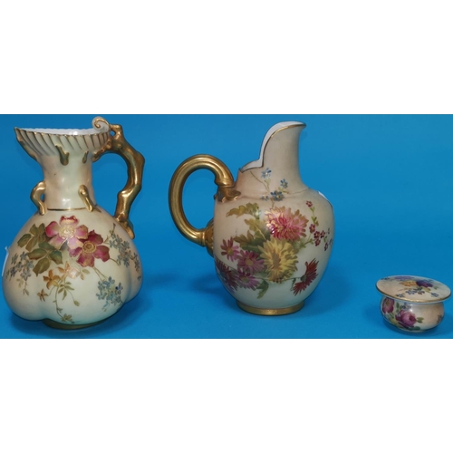 266 - A Royal Worcester peach ground jug with quatrefoil base, gilt claw handle 1507 with floral decoratio... 