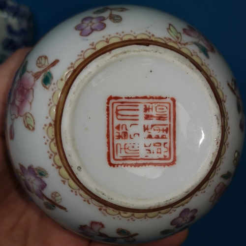274 - A modern Chinese lidded pot with enamelled decoration, five items of blue and white pottery
