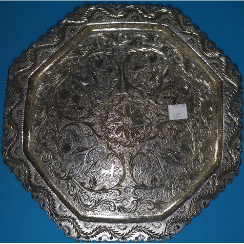 302 - A white metal Middle Eastern hexagonal dish with traditional decoration 17oz.