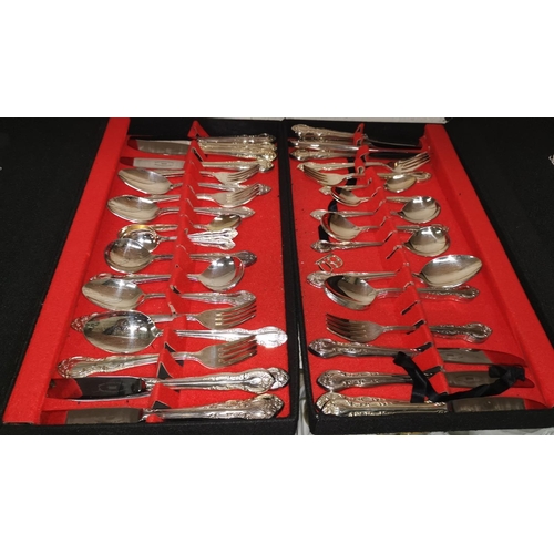 306 - A pair of boxed sets of Falstaff silver plated cutlery, other silver plate and 2 large brass plaques