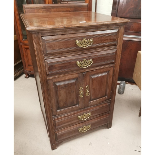 531 - An Edwardian walnut music cabinet with 4 drawers and double cupboard