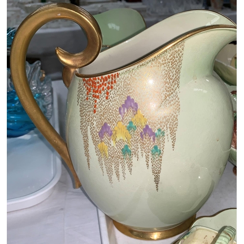 185 - A Carltonware Art Deco ovoid jug with jewelled and gilt decoration of storks and trees; a Carlton pa... 