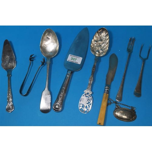 337 - A silver basting spoon; a pair of sugar tongs; a pie slice; berry spoons; etc