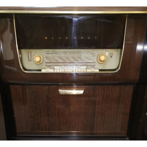 547 - A 1950's Blaupunkt 'Blue Spot' radiogram unit with cocktail section, with mirrored and studded decor... 