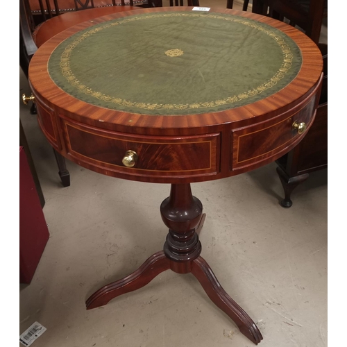 548 - A reproduction mahogany drum table with circular inset top, on pedestal base