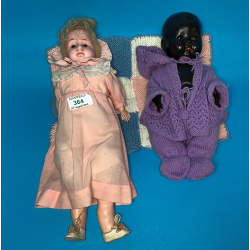 364 - A Victorian wax headed doll and another mid 20th Century doll