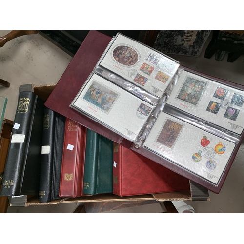 371 - A collection of stamps and first day covers in albums.
