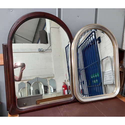 383 - A modern wall mirror in arched mahogany finish frame; a similar in giltwood frame, 36