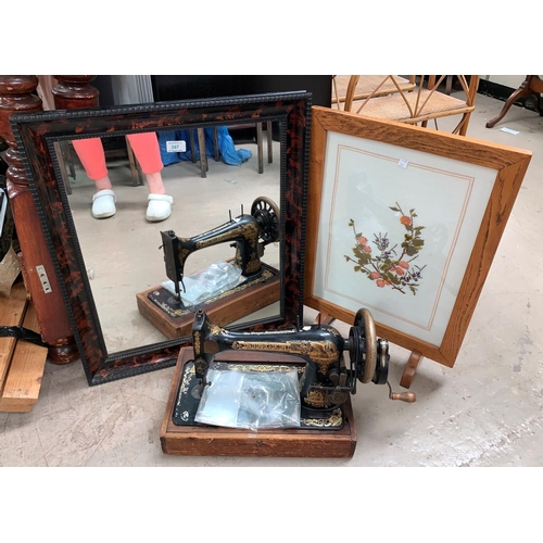 397 - A Singer hand operated sewing machine; a 19th century mirror with tortoiseshell frame, another mirro... 