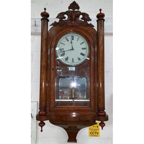 450 - A 19th century American striking wall clock in inlaid walnut case