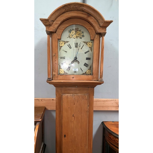 625 - A 19th century pine 30 hour longcase clock with arch top hood and turned pillars, full length door a... 