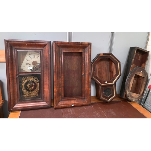 387 - A 19th century American wall clock in mahogany rectangular case, with movement and dial (incomplete)... 