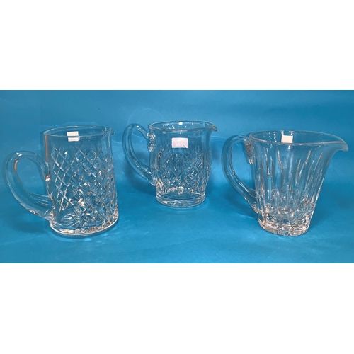 154 - Three  Waterford Crystal water jugs, heights 6