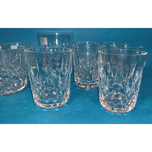 157 - A Waterford Crystal set of 5 whiskey tumblers; 4 similar tumblers; a large single tumbler