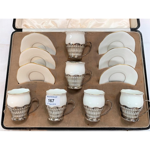 167 - A Coalport boxed set of 6 white porcelain coffee cups in pierced silver holders, Birmingham 1942