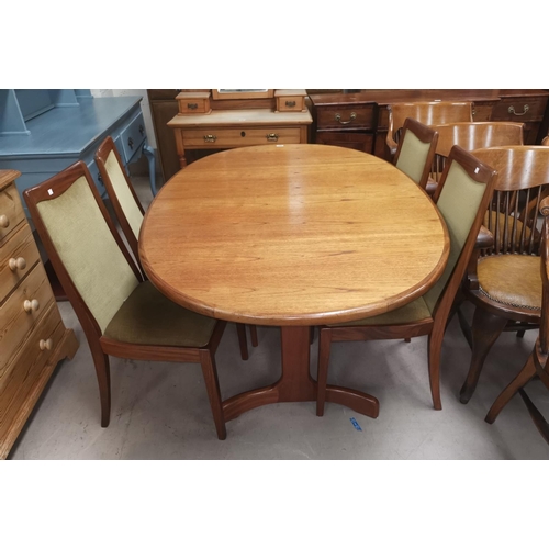 544A - A 1960's G-Plan dining suite comprising extending oval table, and 4 chairs in green dralon