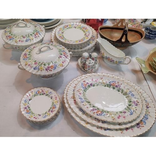 179 - A Royal Doulton ' Easter Morn' dinner service including tureens, meat plates etc