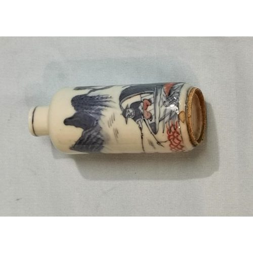 261 - A Chinese porcelain cylindrical  snuff bottle decorated in underglaze blue and red with a pastoral f... 