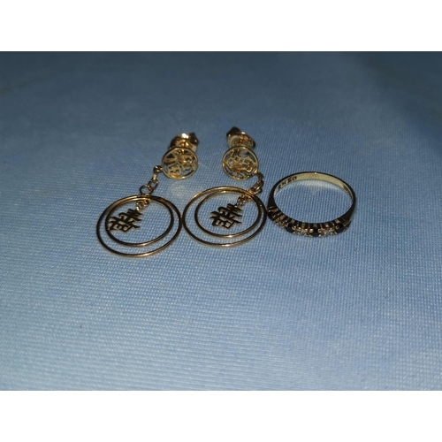 341 - A pair of yellow metal earrings from Malaysia, marked '585'; a 9 carat gold dress ring