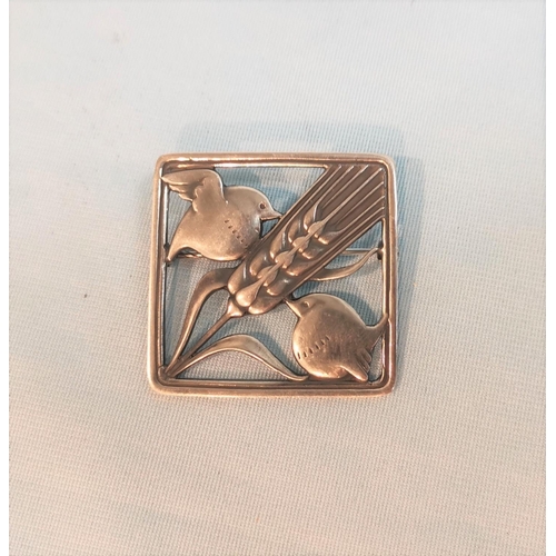 387 - A silver Georg Jensen brooch numbered 250, two birds with head of barley, marked Sterling Denmark