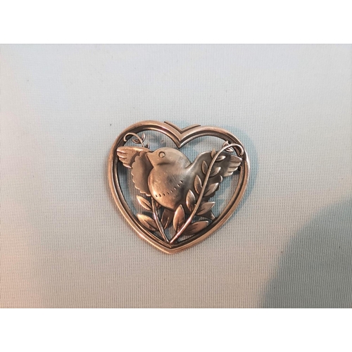 388 - A silver Georg Jensen brooch numbered 239, bird on olive branch inside heart border marked 925 Sterl... 