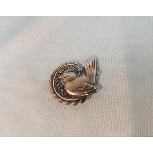 389 - A silver Georg Jensen brooch numbered 309, bird on a fern marked 925 Sterling Denmark