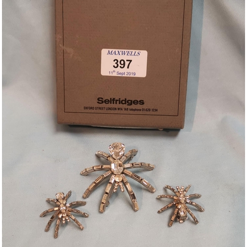 397 - A boxed Butler & Wilson costume set of a spider brooch and matching earrings