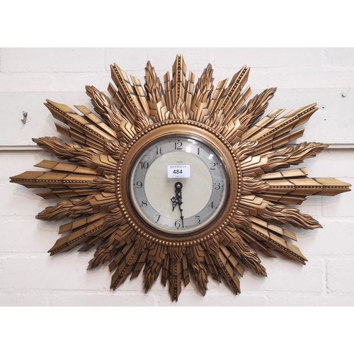 484 - A Smith's Art Deco sunburst clock, 72 cm