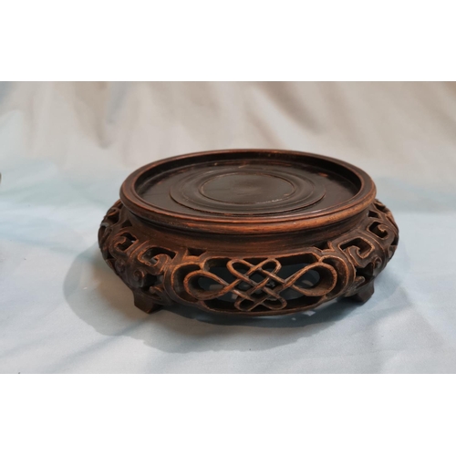 510 - A Newlyn circular copper bowl with flower separator, planished and decorated with fish, etc., impres... 