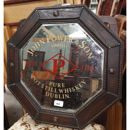 464 - A John Power & Son Pure Potstill Whiskey Dublin octagonal oak framed advertising mirror