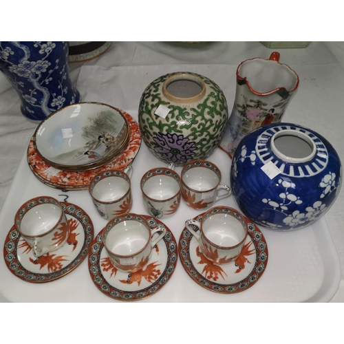 266 - An early 20th century Chinese porcelain tea set decorated with sea creatures; 3 mille fleur plates; ... 