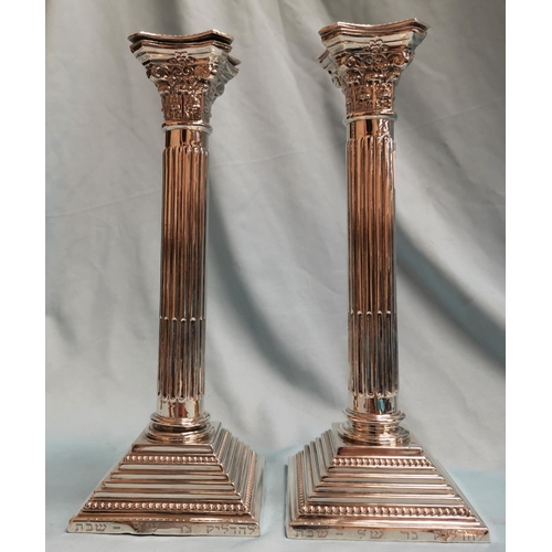 359 - A pair of silver Corinthian column candle sticks on square weighted bases B 1962 net weight 20oz, he... 